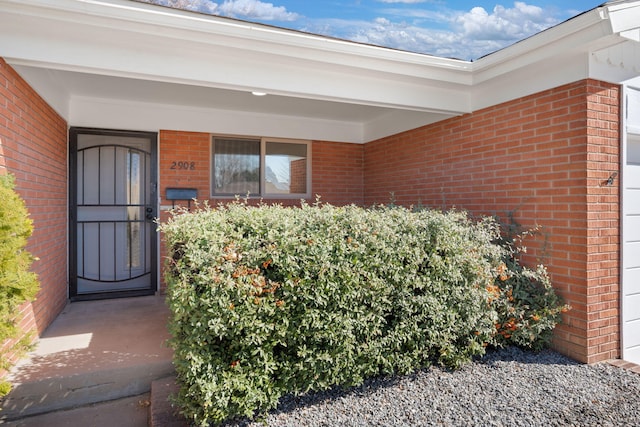 2908 Pennsylvania St NE, Albuquerque, NM 87110 - entrance to property featuring brick siding