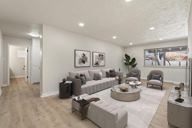 2908 Pennsylvania St NE, Albuquerque, NM 87110 - living area with recessed lighting, a textured ceiling, and light wood finished floors