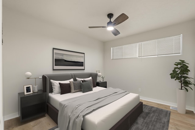 2908 Pennsylvania St NE, Albuquerque, NM 87110 - bedroom featuring baseboards, light wood-style flooring, and ceiling fan