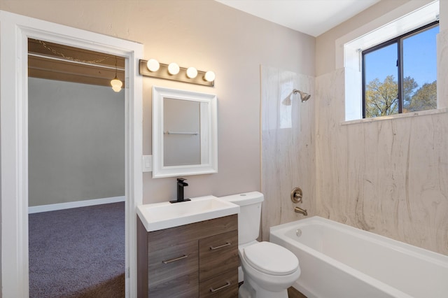 bathroom featuring shower / bath combination, vanity, and toilet