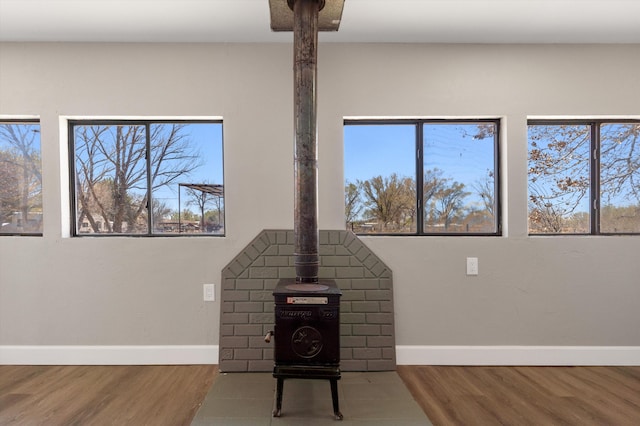 details with wood finished floors and baseboards