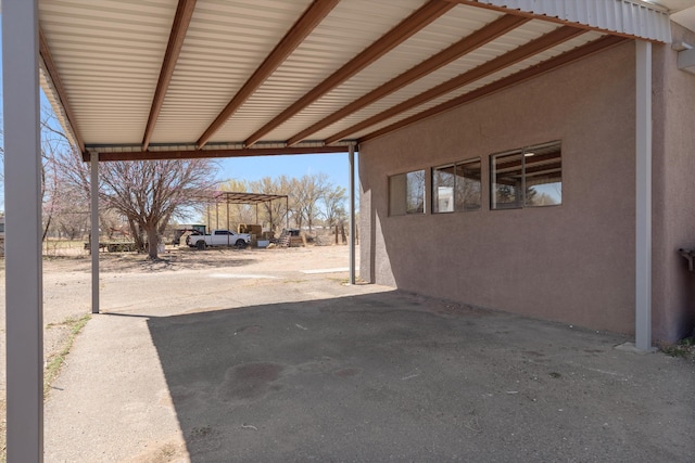 view of patio with a carport