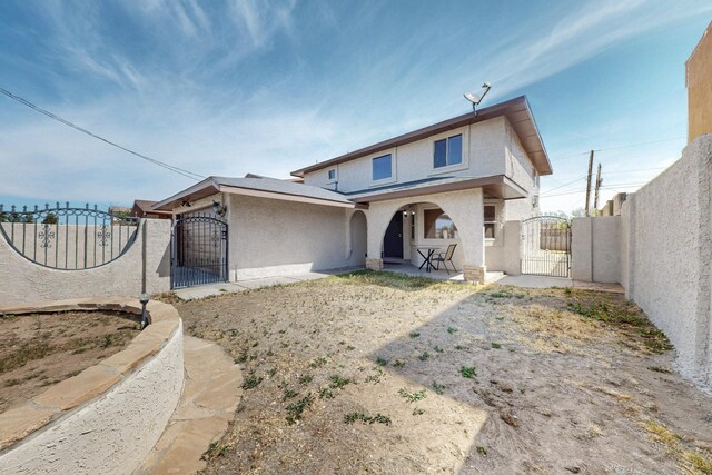 3008 Corona Dr NW, Albuquerque, NM 87120 - exterior space with an attached garage, fence, a gate, and stucco siding