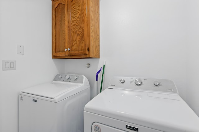 6901 Verano Ct NW, Albuquerque, NM 87120 - washroom featuring cabinet space and washer and clothes dryer