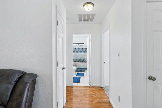 6901 Verano Ct NW, Albuquerque, NM 87120 - hallway featuring light wood-type flooring