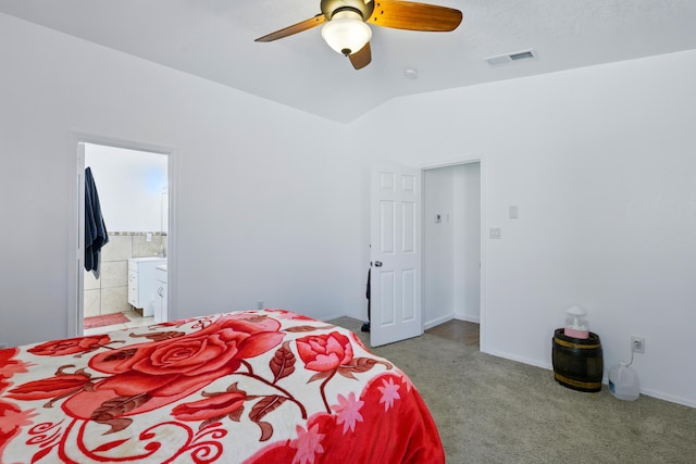 6901 Verano Ct NW, Albuquerque, NM 87120 - bedroom with light carpet, vaulted ceiling, connected bathroom, and a ceiling fan