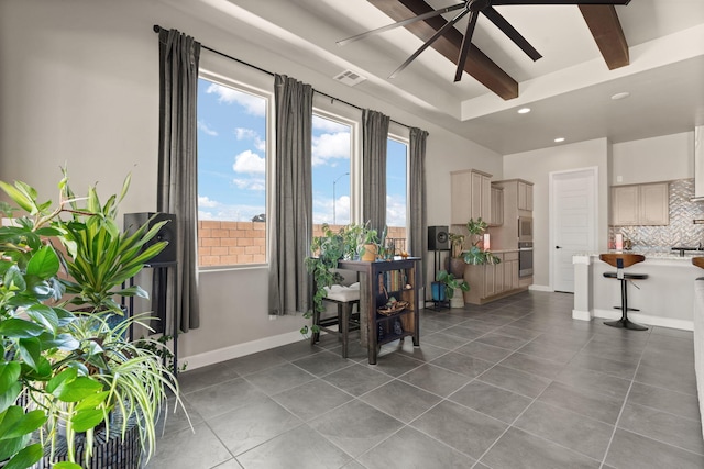 tiled dining room with beam ceiling, baseboards, visible vents, recessed lighting, and a ceiling fan