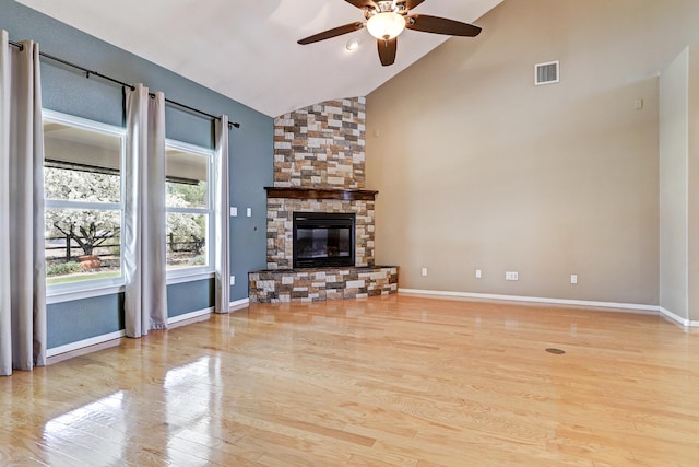 2703 Pueblo Grande Trl NW, Albuquerque, NM 87120 - unfurnished living room with baseboards, visible vents, a ceiling fan, wood finished floors, and high vaulted ceiling