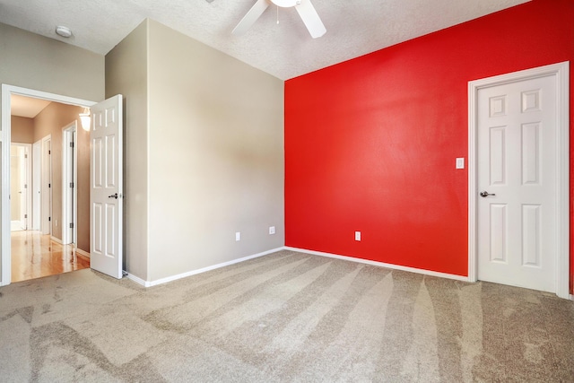2703 Pueblo Grande Trl NW, Albuquerque, NM 87120 - carpeted spare room with baseboards and a ceiling fan