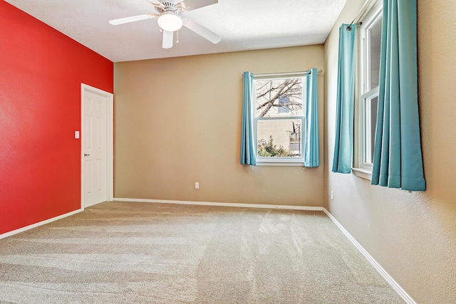 2703 Pueblo Grande Trl NW, Albuquerque, NM 87120 - carpeted empty room with ceiling fan and baseboards