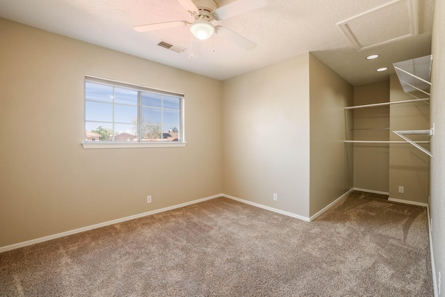 4804 Mesa Terraza Pl NW, Albuquerque, NM 87120 - unfurnished bedroom featuring carpet flooring, attic access, a walk in closet, ceiling fan, and recessed lighting
