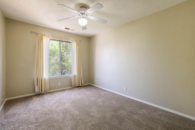4804 Mesa Terraza Pl NW, Albuquerque, NM 87120 - spare room featuring a textured ceiling, ceiling fan, and carpet flooring