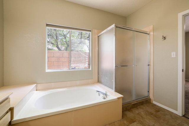 4804 Mesa Terraza Pl NW, Albuquerque, NM 87120 - full bath with a stall shower, a garden tub, and vanity