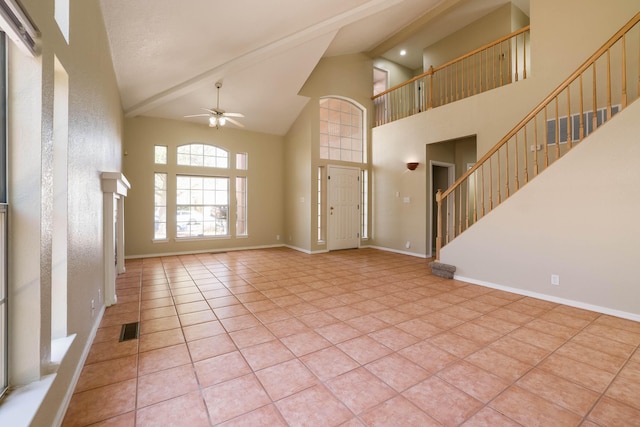 4804 Mesa Terraza Pl NW, Albuquerque, NM 87120 - tiled entrance foyer with high vaulted ceiling, ceiling fan, stairs, and beamed ceiling