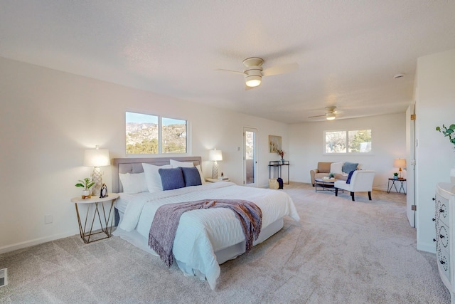4500 Skyline Ct NE, Albuquerque, NM 87111 - bedroom featuring light colored carpet and a ceiling fan