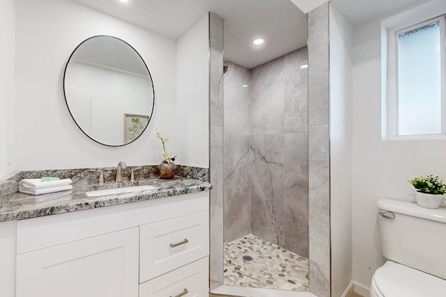 4500 Skyline Ct NE, Albuquerque, NM 87111 - full bath with vanity, a marble finish shower, and recessed lighting