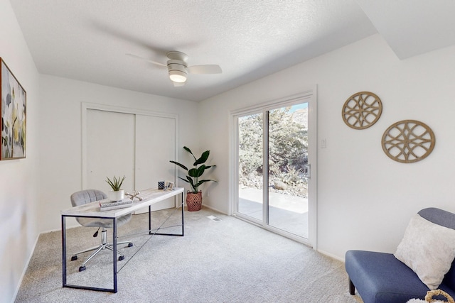 4500 Skyline Ct NE, Albuquerque, NM 87111 - carpeted home office featuring a ceiling fan and a textured ceiling