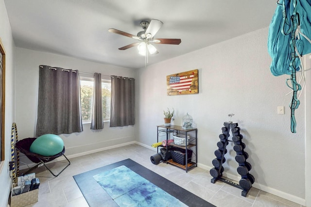 3501 Westerfeld Dr NE, Albuquerque, NM 87111 - exercise area with tile patterned floors, ceiling fan, and baseboards