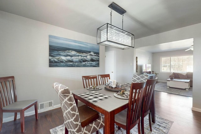 3501 Westerfeld Dr NE, Albuquerque, NM 87111 - dining space featuring wood finished floors, baseboards, a ceiling fan, and visible vents