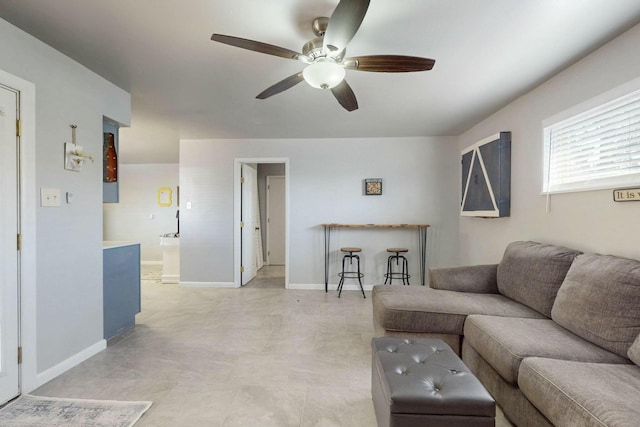 3501 Westerfeld Dr NE, Albuquerque, NM 87111 - living room featuring ceiling fan and baseboards