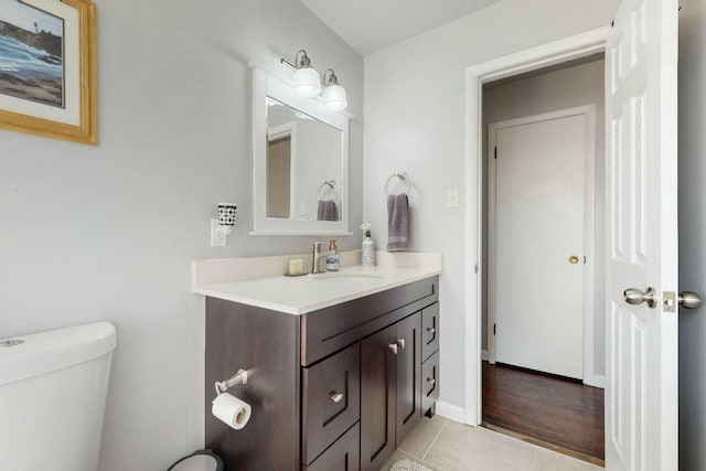 3501 Westerfeld Dr NE, Albuquerque, NM 87111 - half bath featuring tile patterned floors, vanity, and toilet