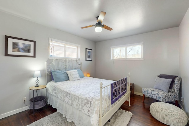 3501 Westerfeld Dr NE, Albuquerque, NM 87111 - bedroom featuring baseboards, multiple windows, ceiling fan, and wood finished floors