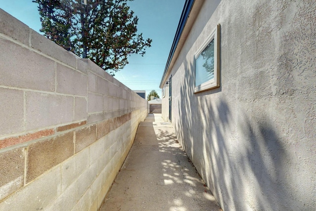 3501 Westerfeld Dr NE, Albuquerque, NM 87111 - view of property exterior featuring stucco siding and fence