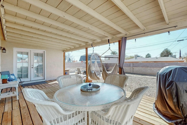 3501 Westerfeld Dr NE, Albuquerque, NM 87111 - wooden deck featuring outdoor dining area, french doors, fence private yard, and area for grilling