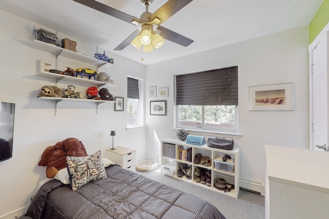 2 Cedar Hill Pl, Cedar Crest, NM 87008 - carpeted bedroom featuring a baseboard radiator and a ceiling fan