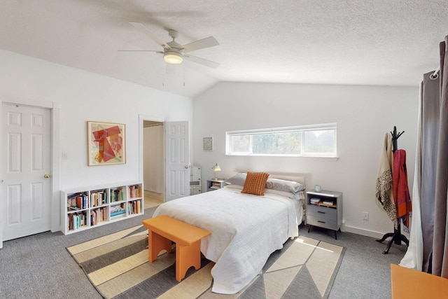 2 Cedar Hill Pl, Cedar Crest, NM 87008 - bedroom featuring light colored carpet, vaulted ceiling, and a ceiling fan