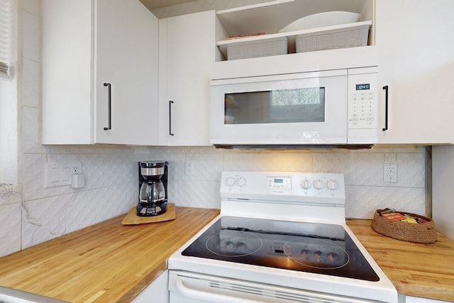 2 Cedar Hill Pl, Cedar Crest, NM 87008 - kitchen with white appliances, wooden counters, white cabinets, and decorative backsplash
