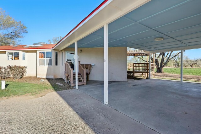 view of patio with an attached carport