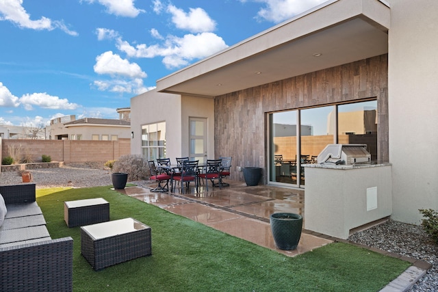 8023 Victoria Dr NW, Albuquerque, NM 87120 - exterior space featuring a yard, an outdoor kitchen, fence, and a patio