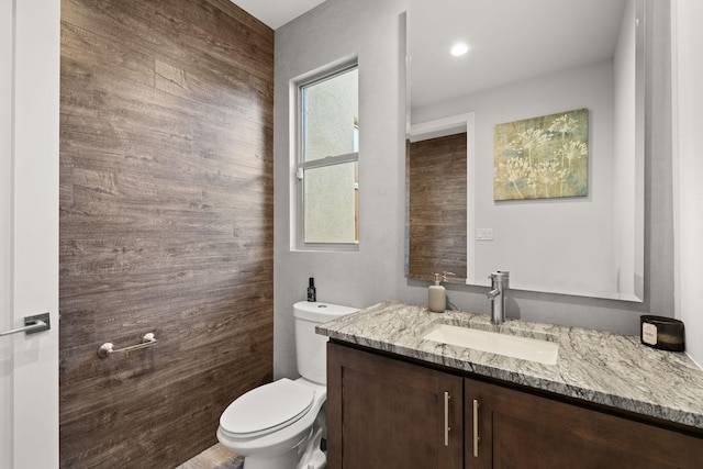 8023 Victoria Dr NW, Albuquerque, NM 87120 - half bathroom featuring toilet and vanity