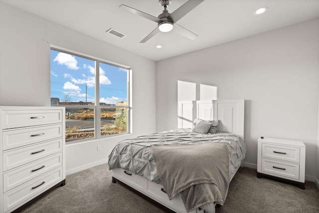 8023 Victoria Dr NW, Albuquerque, NM 87120 - bedroom featuring dark carpet, recessed lighting, baseboards, and visible vents