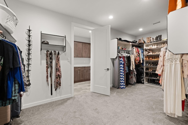 8023 Victoria Dr NW, Albuquerque, NM 87120 - spacious closet with carpet flooring and visible vents