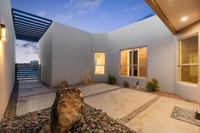 8023 Victoria Dr NW, Albuquerque, NM 87120 - entrance to property with a patio area and stucco siding