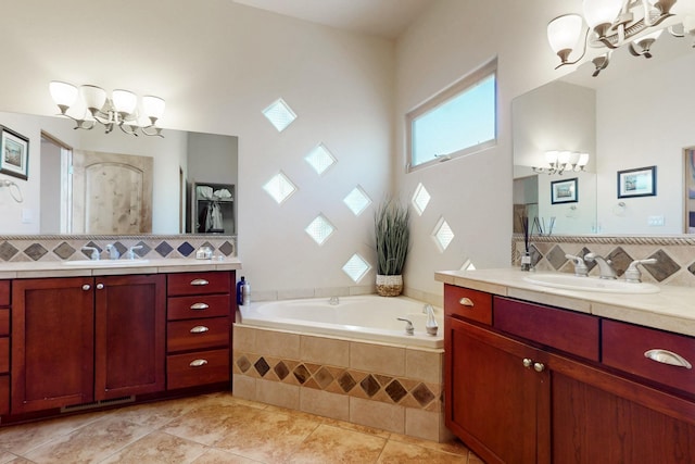 9840 Cameron St NW, Albuquerque, NM 87114 - bathroom featuring a sink, tile patterned flooring, a chandelier, decorative backsplash, and a bath