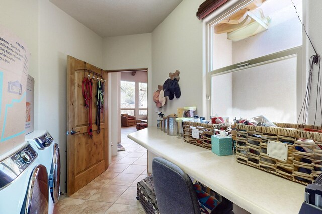 9840 Cameron St NW, Albuquerque, NM 87114 - laundry area featuring separate washer and dryer, laundry area, and light tile patterned flooring