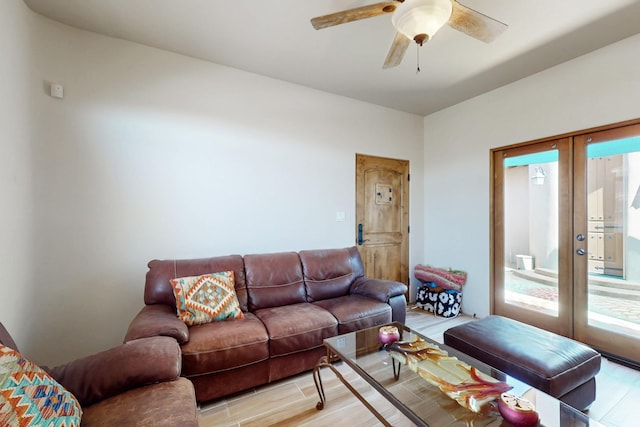 9840 Cameron St NW, Albuquerque, NM 87114 - living area featuring ceiling fan, a healthy amount of sunlight, french doors, and light wood-style floors