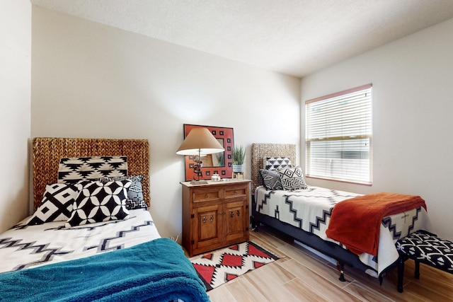 9840 Cameron St NW, Albuquerque, NM 87114 - bedroom featuring wood tiled floor