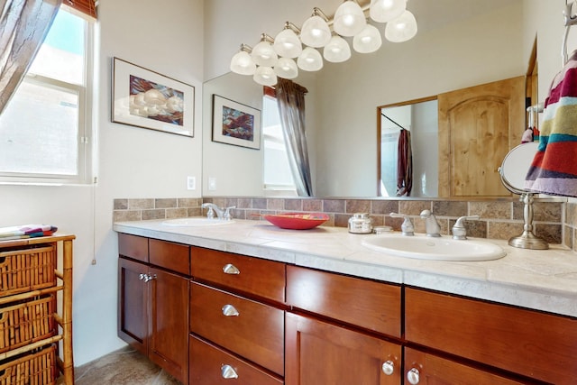 9840 Cameron St NW, Albuquerque, NM 87114 - full bathroom with double vanity and a sink