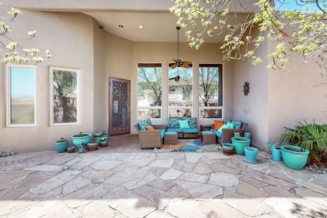 9840 Cameron St NW, Albuquerque, NM 87114 - view of patio featuring ceiling fan and an outdoor hangout area