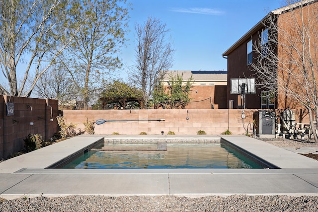 7327 Hearthstone Rd NW, Albuquerque, NM 87114 - view of pool featuring a fenced backyard