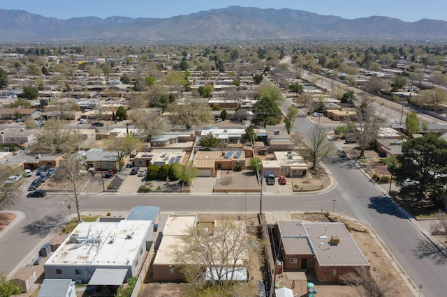birds eye view of property with a residential view and a mountain view