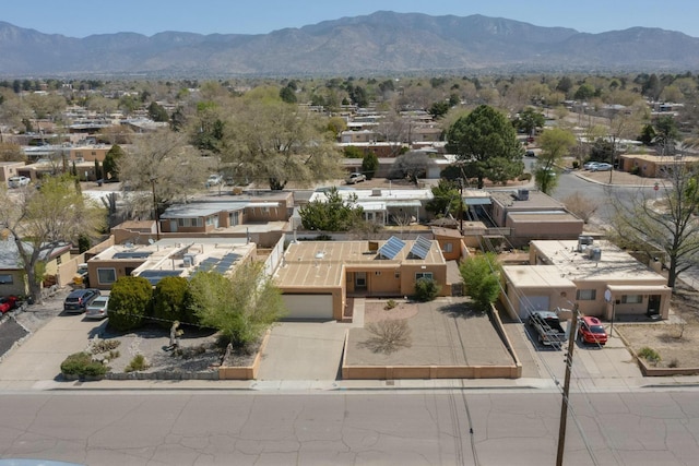 birds eye view of property featuring a residential view and a mountain view