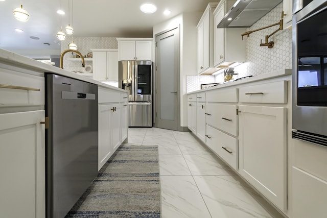 kitchen with ventilation hood, light countertops, stainless steel appliances, decorative backsplash, and marble finish floor