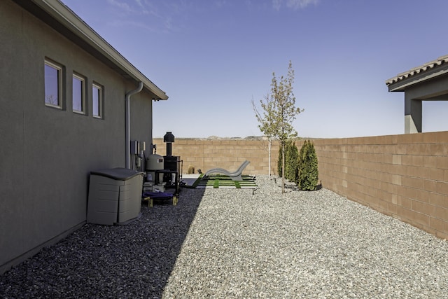 view of yard featuring a fenced backyard and a patio area