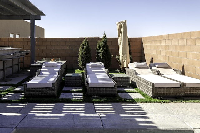 view of patio / terrace with a fenced backyard and outdoor lounge area