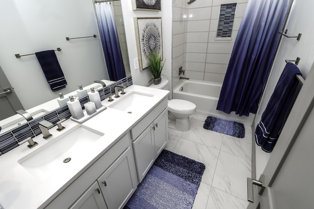 bathroom with a sink, shower / tub combo with curtain, double vanity, and marble finish floor